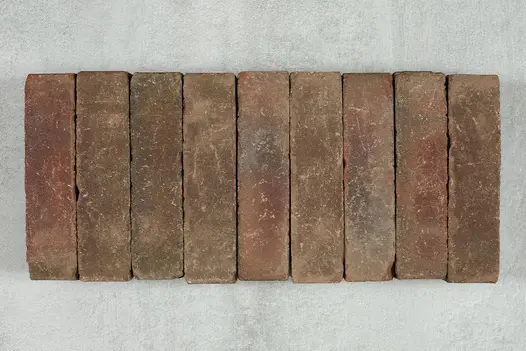 9 Abbey Dark Multi clay paving bricks, showing grey and red tones, placed side by side against pale background.