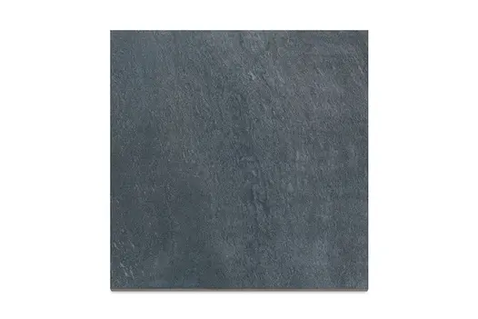 A close-up of Allora Nero porcelain paving, showcasing its dark grey tones, subtle veining, and textured stone-effect surface.