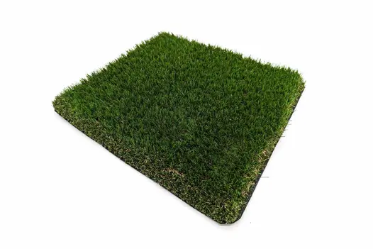 A detailed image of an artificial grass sample, highlighting its thick and soft texture.