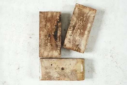Three London Mixture Clay Paver Bricks laid on white background to show off colour and texture. Free UK Delivery.