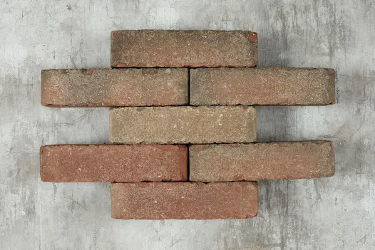 7 Bexhill clay pavers laid in 5 alternating rows of 1 and 2 bricks, showing sanded face, against pale background.