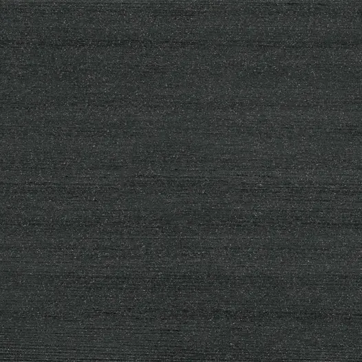 Close-up swatch of DesignBoard fascia in Charcoal, featuring a deep dark-grey woodgrain texture.