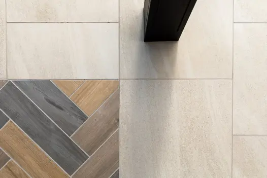 Detailed close-up of Allora Bianco 600x600mm porcelain, showcasing fine-grain texture and soft neutral hues that mimic natural stone.