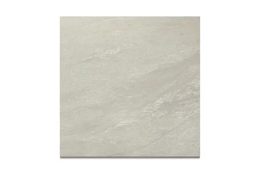 A close-up swatch of County Light porcelain paving, showcasing its subtle texture and light grey tones for a sleek, modern finish.