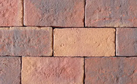 Close-up view from directly above of Dorset Antique clay paver bricks abutted, showing colour variation. Free UK delivery available.