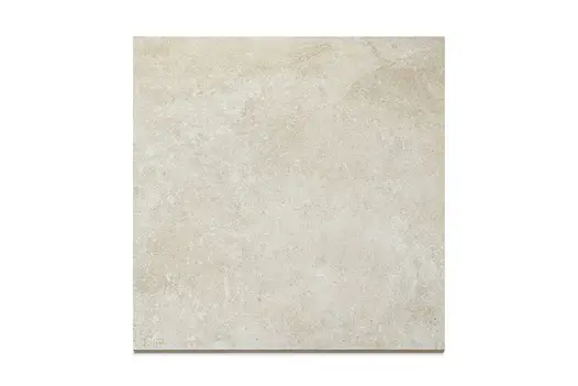 Close-up swatch of Heritage Chalk 900x600 porcelain paving, featuring light beige tones and a soft textured finish.