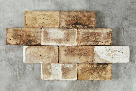 10 London Mixture clay pavers laid face-up to form a geometric shape of 4 rows comprising 2 and 3 bricks. Free UK delivery available.