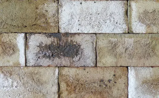 Nine London Mixture belgian bricks shown in close up show off the clay pavers colour variations and texture.