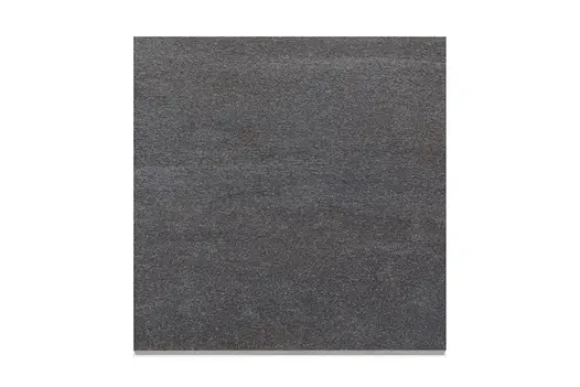 Close-up swatch of Overland Dark Porcelain, showcasing its deep grey tones and fine stone-effect texture.