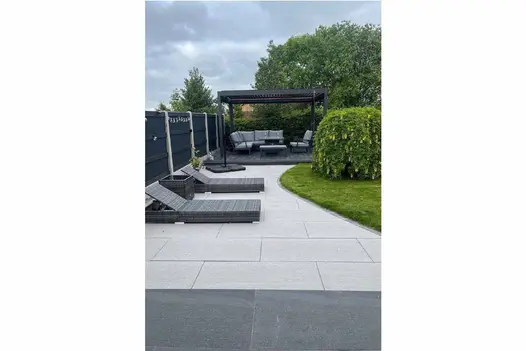 Contrasting patio design using Overland Dark and Silver 1200x600 porcelain slabs for a striking contemporary effect.