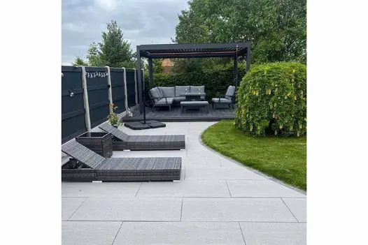 Striking patio layout featuring Overland Dark and Silver 1200x600 porcelain slabs in a bold, modern contrast.