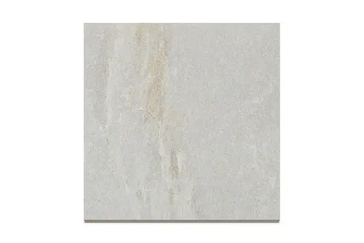 Close-up swatch of Pumice porcelain paving, showing its soft stone-effect texture and light grey tones.