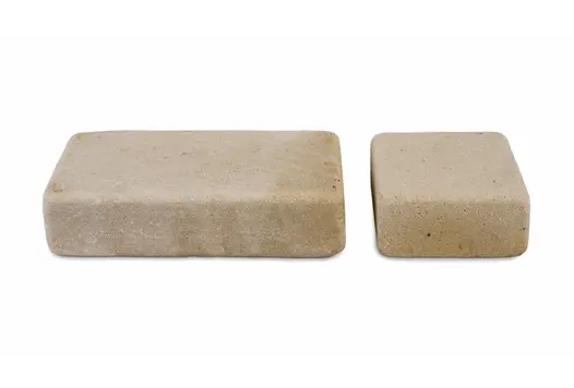 1 rectangular and 1 square set sit next to each other on white background to show texture and relative shape and size.