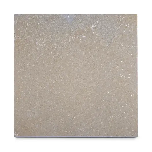 Single Kota Brown limestone slab seen from above, showing riven surface texture and markings. Free UK delivery available.