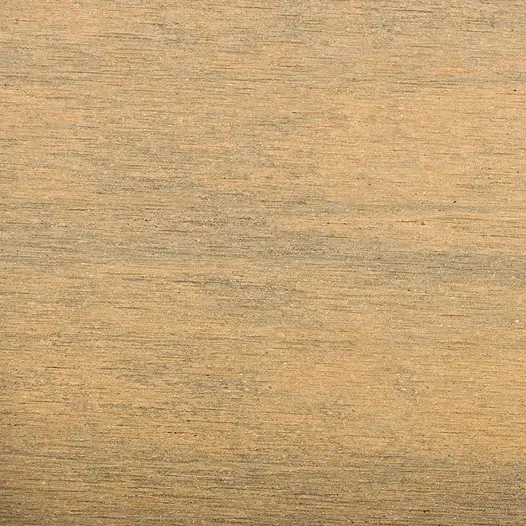 view from above of warm teak brushed composite decking uk, showing off texture and colour.