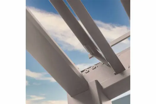 Close-up of corner of white powder-coated aluminium frame of Proteus Pergola, roof louvres fully open, with sky above.